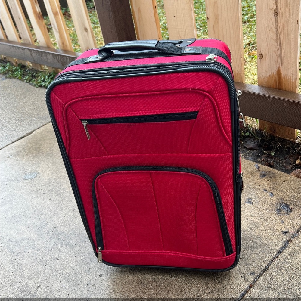 Brand new, never been used red suitcase